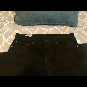 Black Levi’s 502 36 x 30 jeans.